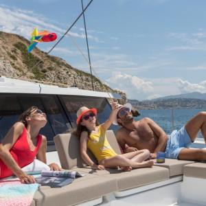 a person sitting on a boat in the water