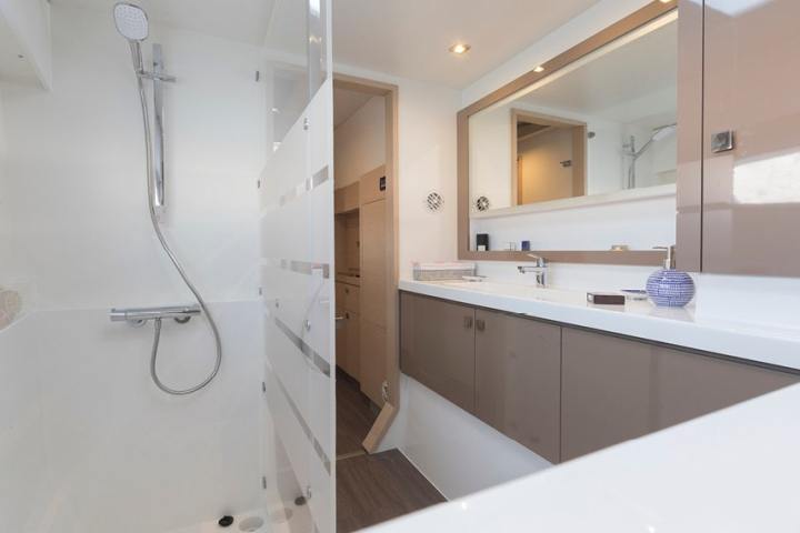 a room with a sink and a shower