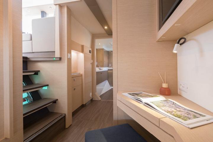 a bedroom with a bed and a mirror