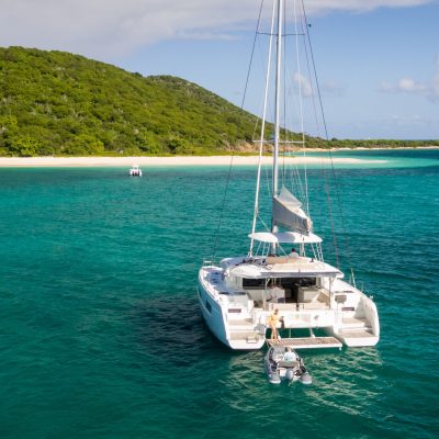 a small boat in a large body of water