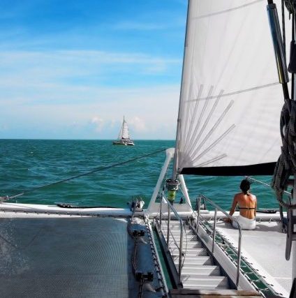 a boat is docked next to a body of water