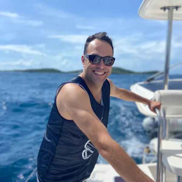 a man that is standing in the water