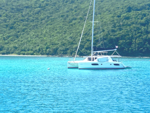 a small boat in a large body of water