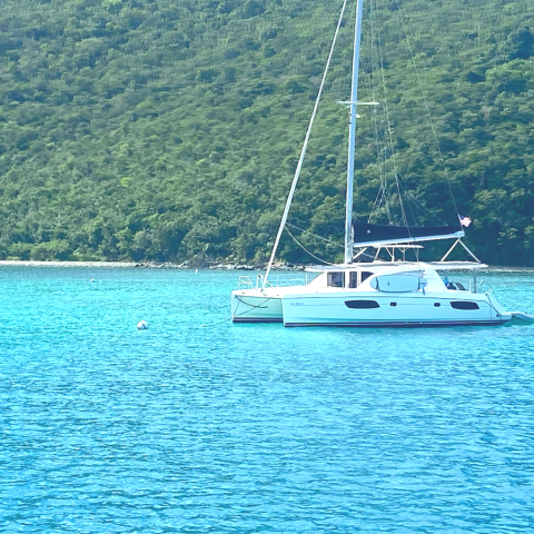 a small boat in a large body of water
