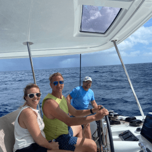 a group of people in a boat on a body of water