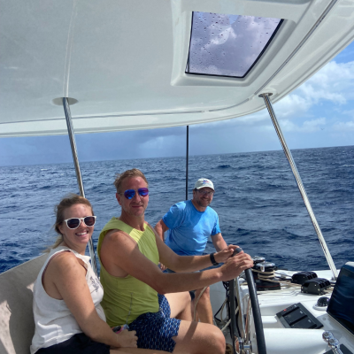a group of people in a boat on a body of water