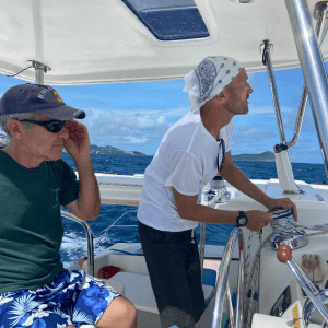 a group of people on a boat in the water