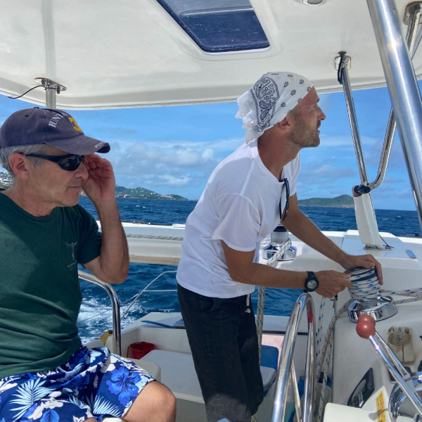 a group of people on a boat in the water