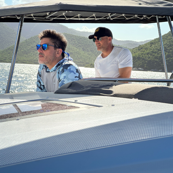 a man sitting on a boat