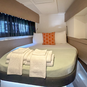 a bedroom with a large bed in a room