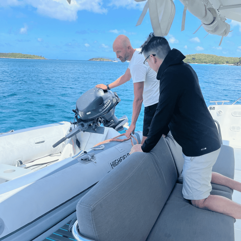 a person sitting on a boat in the water