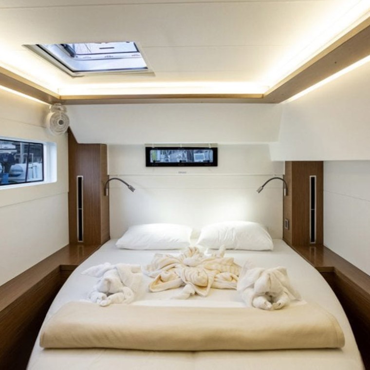 a bedroom with a bed in a room