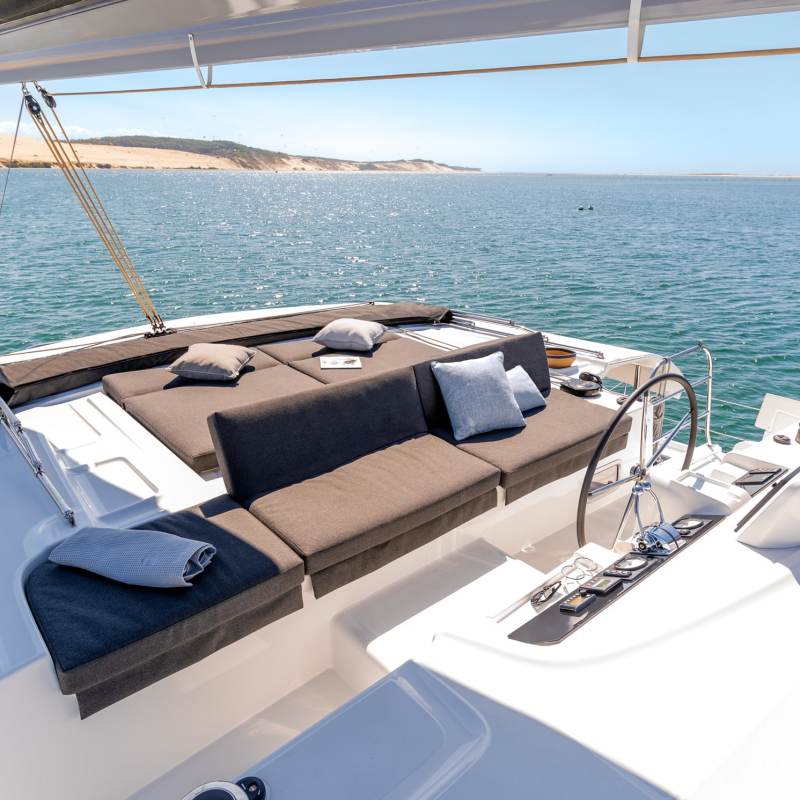 a boat is docked next to a body of water