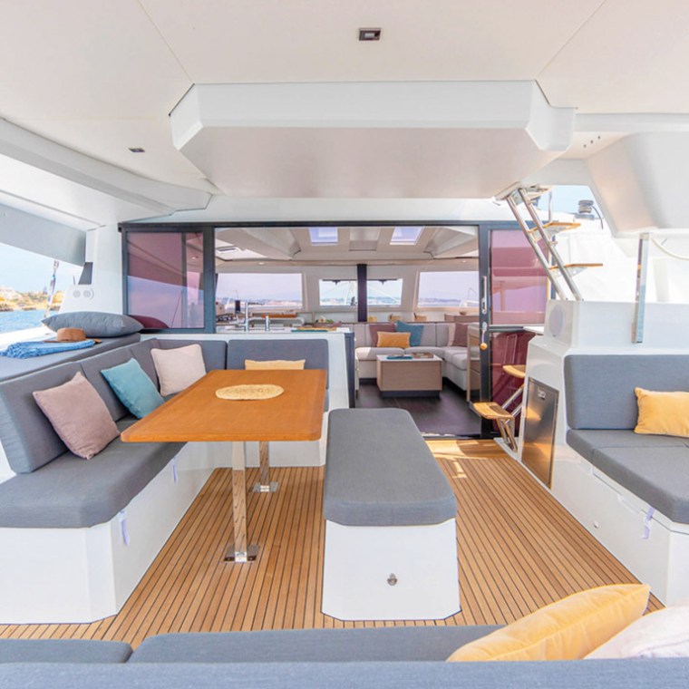 a living room filled with furniture and a table