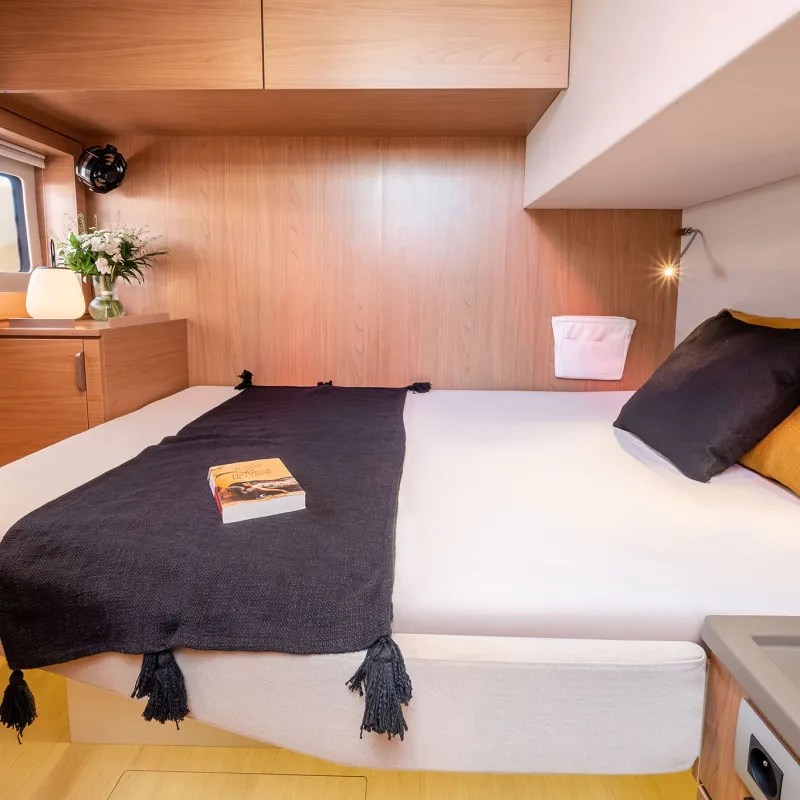 a bedroom with a bed in a room