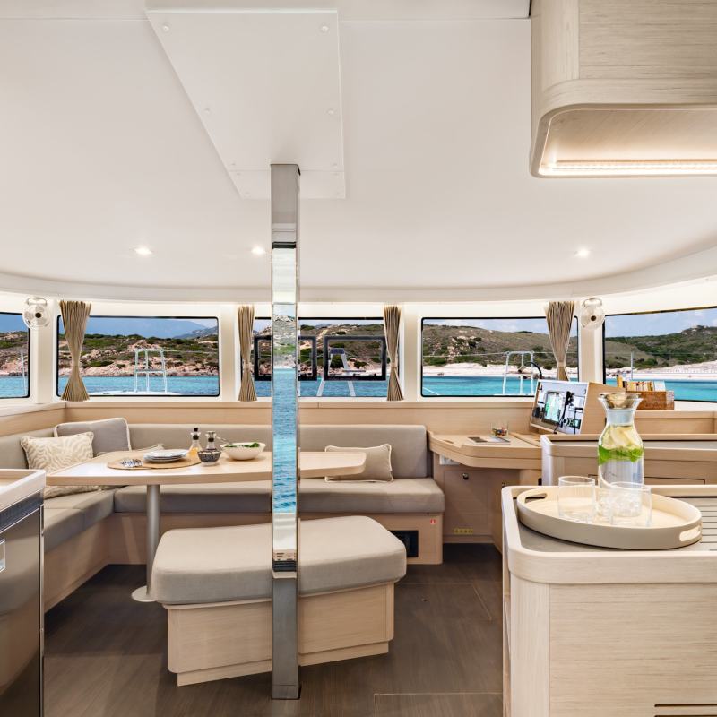 a room filled with furniture and a large window