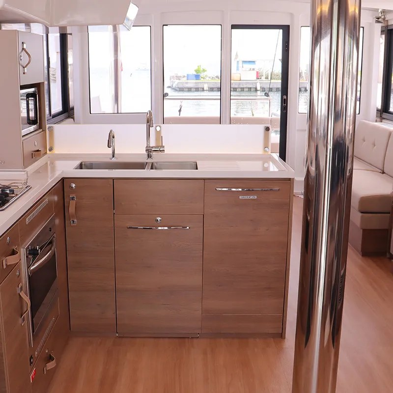 a kitchen with a sink and a window