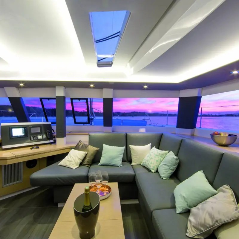 a living room filled with furniture and a flat screen tv