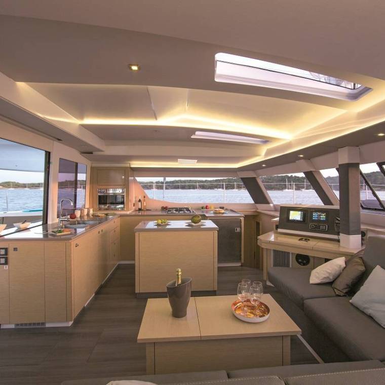 a room filled with furniture and a large window