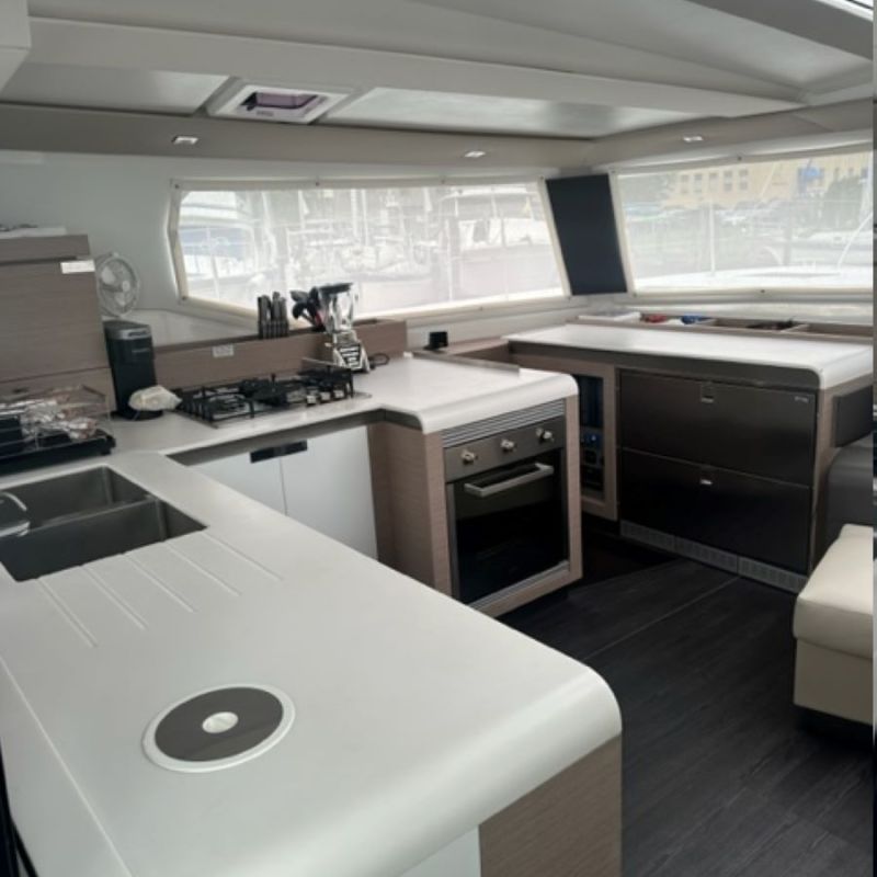 a stove top oven sitting inside of a kitchen
