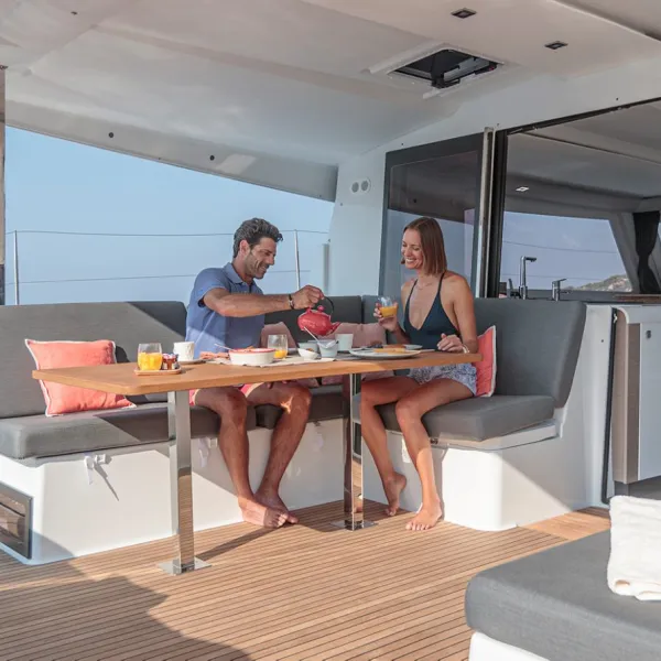 a person sitting at a desk in a room