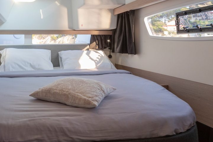 a bedroom with a large bed in a hotel room