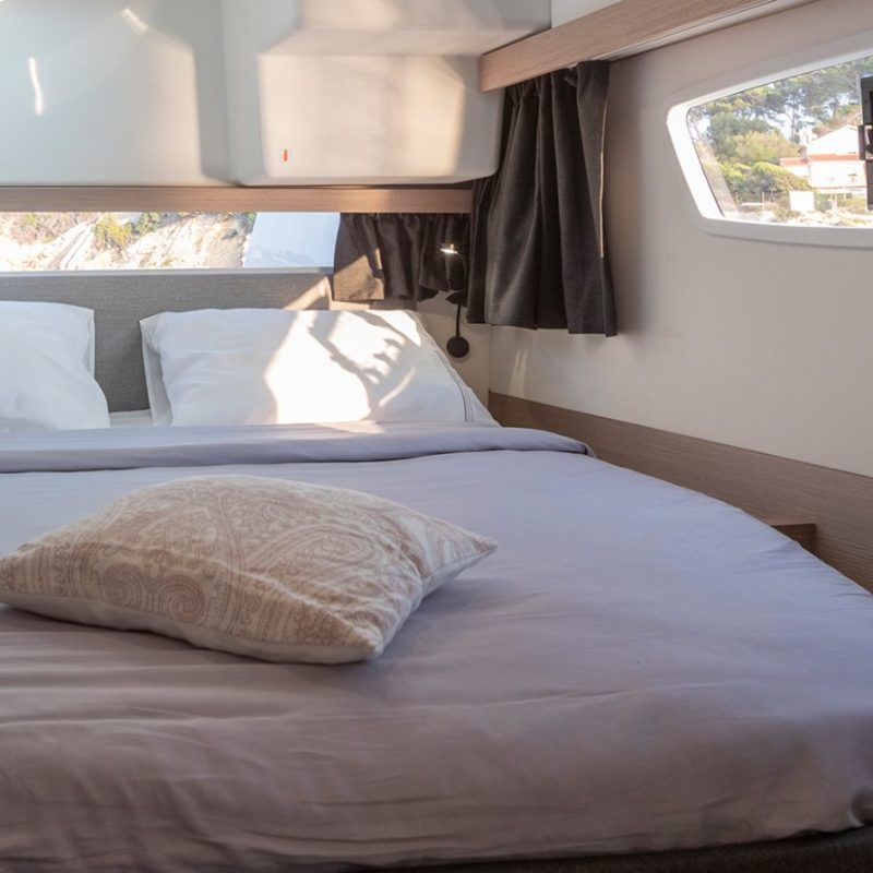 a bedroom with a large bed in a hotel room